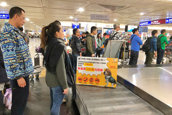 非洲豬瘟丨台灣桃園機場防疫升級 陸港澳客落機即查行李