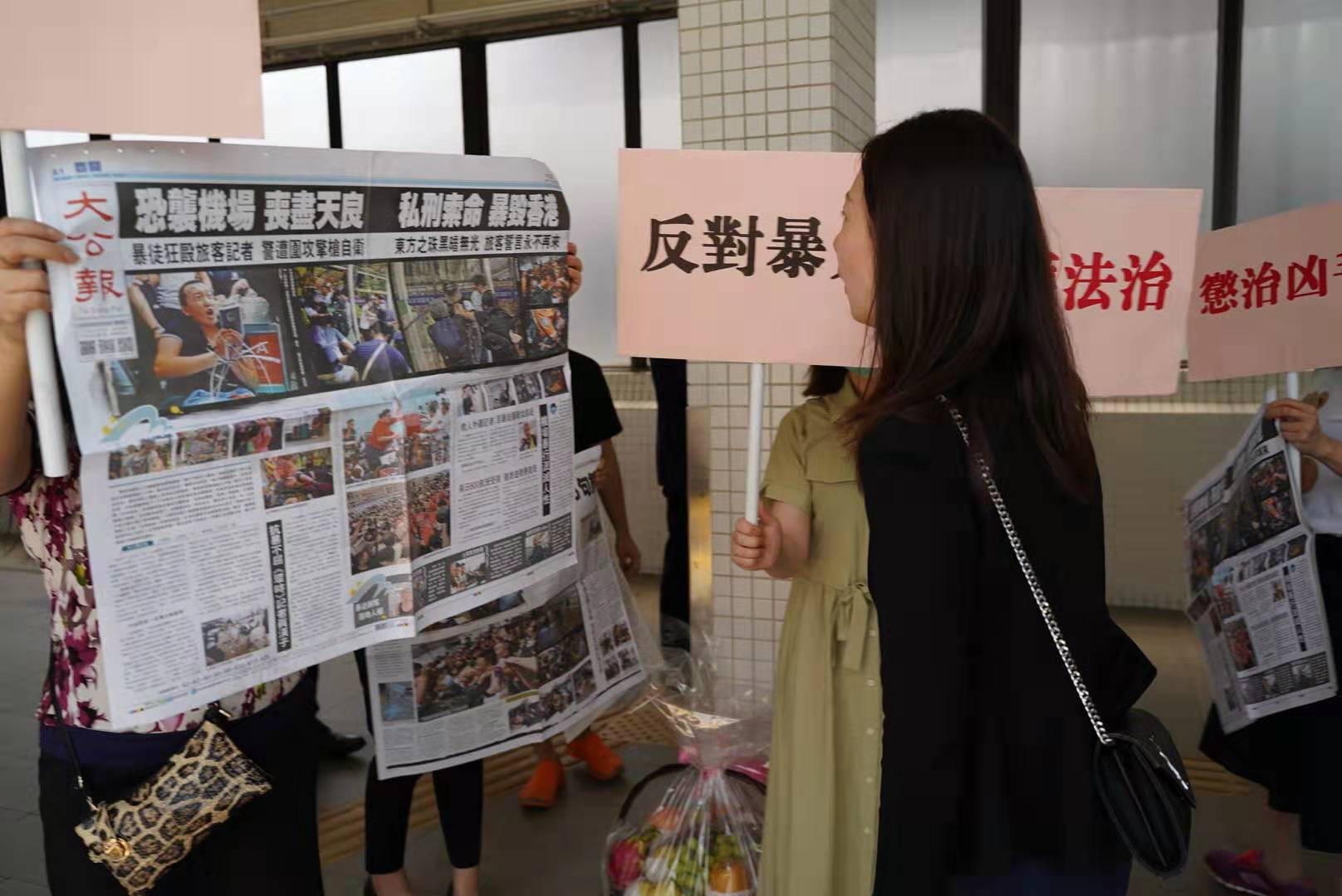 環球時報記者出院 香港市民讚「好樣的」