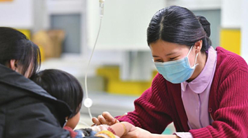 中疾控专家：中国部分省份流感活动高峰已经出现拐点