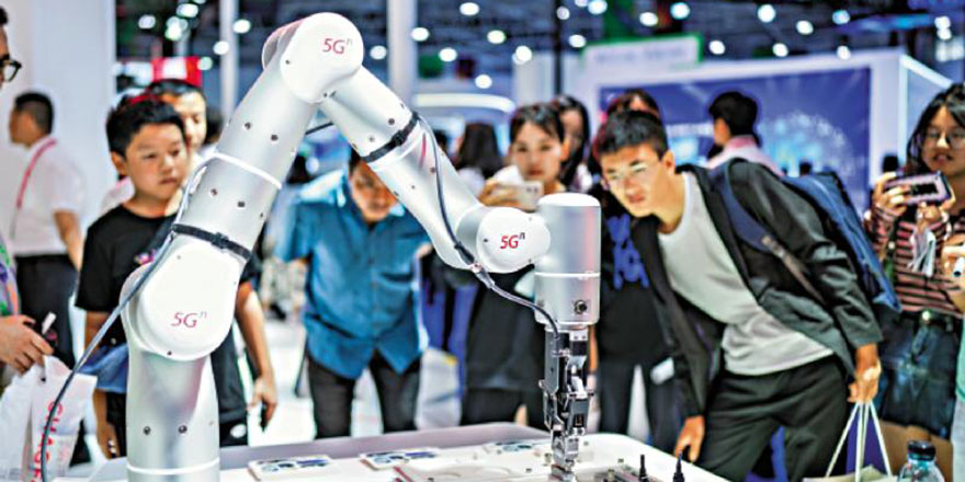 习近平：参与世贸改革 维护多边贸易体制