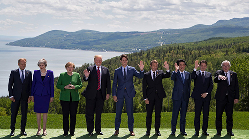 ﻿特朗普G7迟到又早退 威胁盟友勿报复