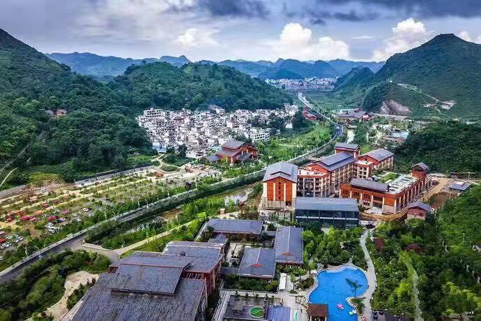 贵州避暑采风行"采风团成员走进六枝落别乡,探访特区如何以"旅游 "促