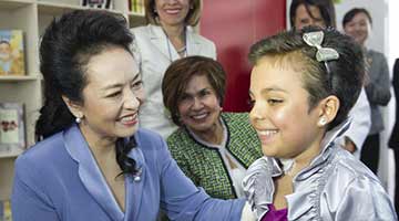 ﻿彭丽媛接受联合国《信使》专访：不让一个女童因疫情掉队