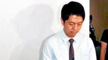 ﻿许智峯被颁令破产 警方正式通缉周庭