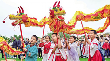  Inject new ceremony, "old" Dragon Boat Festival brings new feeling