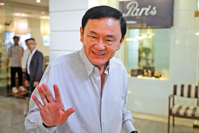  Former Thai Prime Minister Thaksin is indicted for offending the monarch