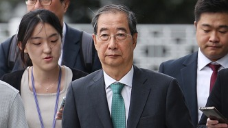涉嫌“内乱罪” 韩国前总理韩德洙被传讯