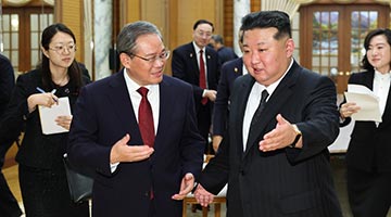李强会见朝鲜劳动党总书记、国务委员长金正恩