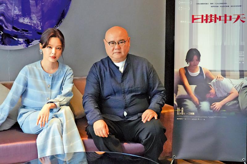 ﻿与导演蔡尚君合作默契